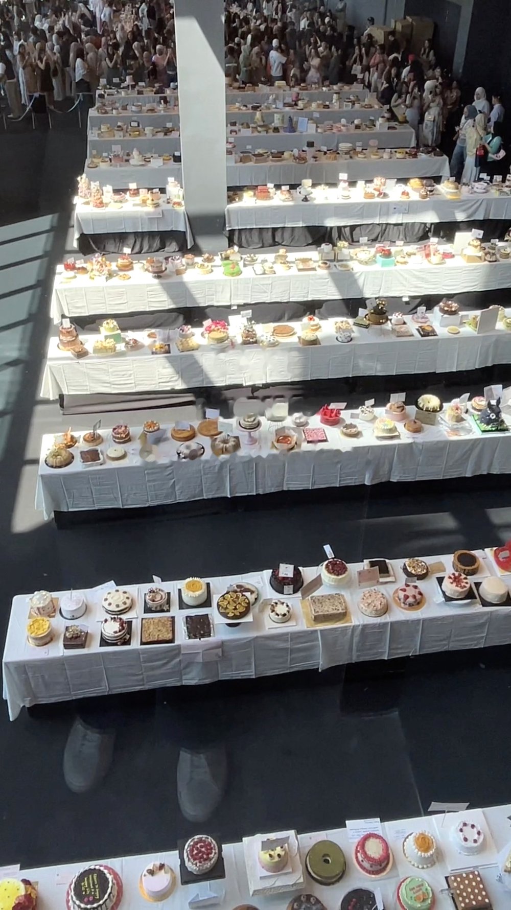 Rows of cake tables at Cakewalk, seen from above