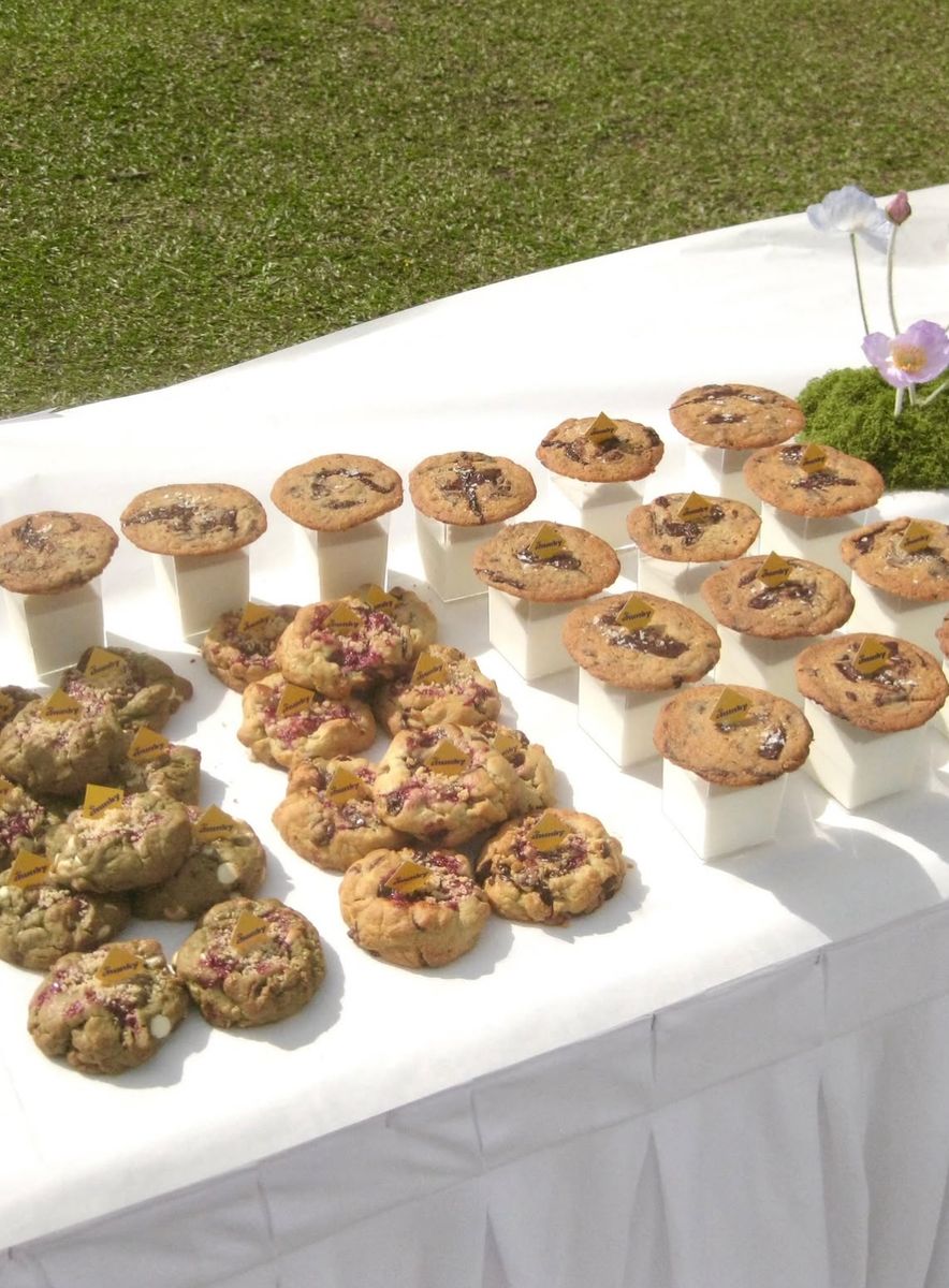 Rows of cookies on a picnic table at Cookie Picnic