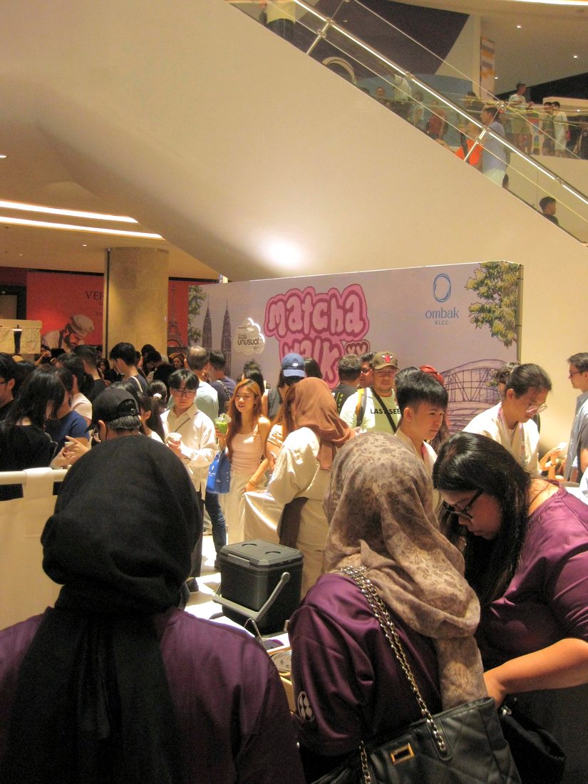 Crowds in front of the MATCHAWALK backdrop at Ombak KLCC