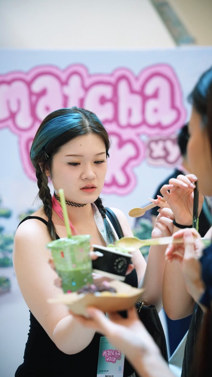 A guest tasting matcha desserts at MATCHAWALK