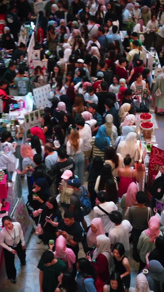 Packed aisles of the festival seen from above