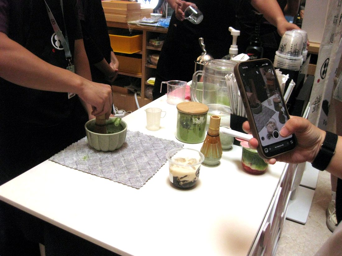 Matcha being whisked at a live demo